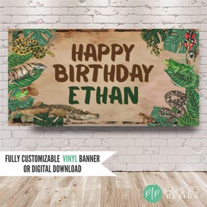 May include: A rectangular banner featuring the text HAPPY BIRTHDAY ETHAN in brown and green letters. The design includes illustrations of various reptiles and amphibians, including a crocodile, snakes, lizards, and a frog, surrounded by green tropical leaves.