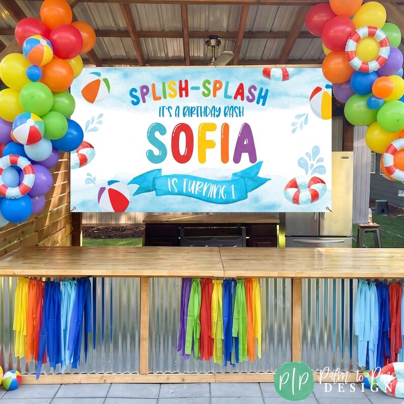 Kids Splish Splash Birthday party with colorful beach ball decorations and personalized banner