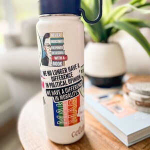 water bottle decorated with political statement stickers supporting RBG, LGBTQA+, human rights and political morality