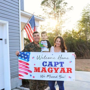 military welcome home banner with USA flag and personalized name