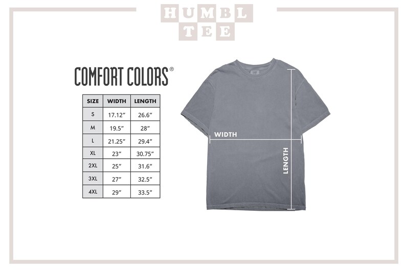 Op de afbeelding: Een grijs Comfort Colors t-shirt met maat- en meetgegevens. De breedte en lengte van het shirt worden met pijlen aangegeven. De maattabel toont de afmetingen in cm.