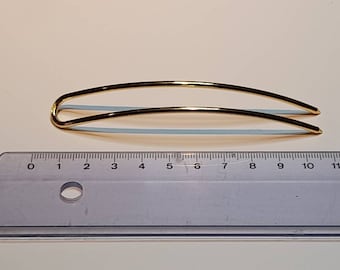 Una horquilla para el pelo de acero resistente y probada en color plata, horquilla para moño, soporte para moño, horquilla para el pelo larga de plata para peinados recogidos.