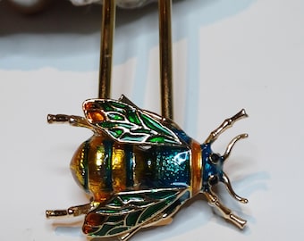 Haarspelden met versieringen van bijen, kevers en konijnen; beproefde, stevige haarspelden; goudkleurige knotspelden; knothouders; lange haarvorken; opsteekkapsels; cadeau