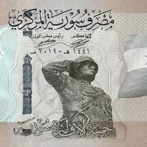May include: A Syrian 5000 Lira banknote. The front features Arabic script, a portrait of a soldier, and the Syrian flag. The serial number is visible. The note has a tan and brown colour scheme.