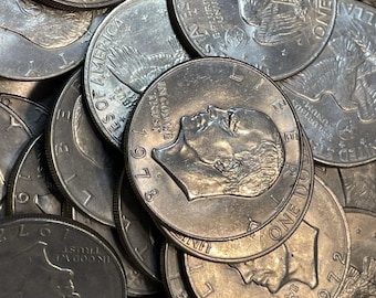 One (1) Eisenhower “IKE” Dollar - coin will be from the years 1971 through 1978 randomly pulled