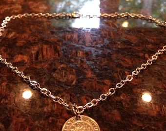 Antillas Neerlandesas collar de monedas de 25 centavos