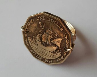 Belize ring omwikkeld met 1 dollar