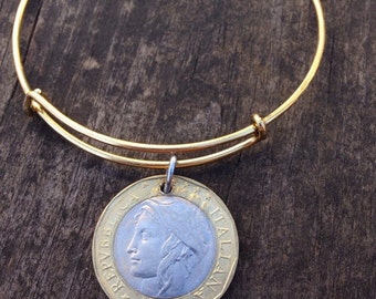 Pulsera rígida expandible de alambre estilo brazalete, Italia, 1000 liras