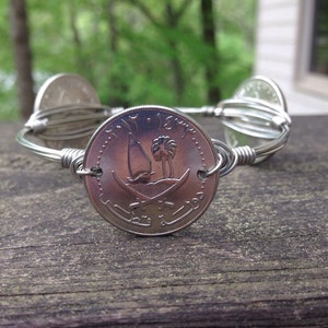 Qatar 50 dirhams  Bourbons and Boweties style wire bangle bracelet