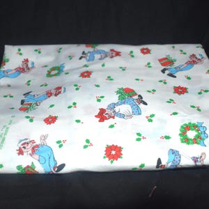 Raggedy Ann & Andy Christmas Fabric by Bobbs-Merrill Co., Inc. 1978