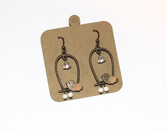 Boucles d'oreilles oiseau anciennes, boucles d'oreilles oiseau swing, boucles d'oreilles oiseau perché, boucles d'oreilles oiseau sur pied, boucles d'oreilles oiseau printanier. Oiseaux suspendus