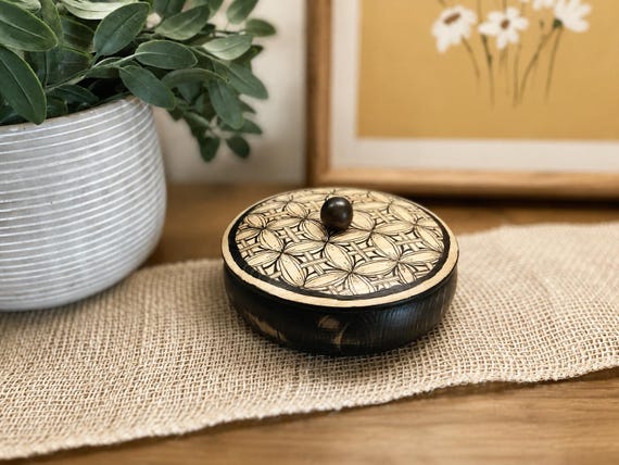 A genuinely hand-drawn wooden trinket box — the kind of one-of-a-kind object that feels like it came from an artisan's studio, not a warehouse.