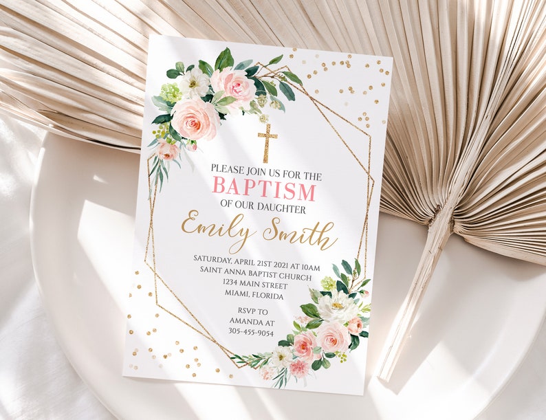 May include: A white baptism invitation with a gold geometric frame and pink and white floral accents. The text reads "Please join us for the Baptism of our daughter Emily Smith" and includes the date, time, location, and RSVP information.
