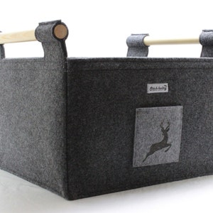 Sturdy felt firewood basket with wooden side handles and stag