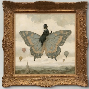 May include: A framed wall art print featuring a cat wearing a black top hat and coat, riding a large blue and orange butterfly. The scene includes several hot air balloons floating above a landscape with a church steeple under a cloudy sky.