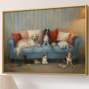 May include: A rectangular wall art print in a gold frame depicting a blue sofa with several dogs resting on and around it. The scene includes a golden retriever, a black and white dog, a small terrier, a dachshund, a corgi, and a beagle with a toy.