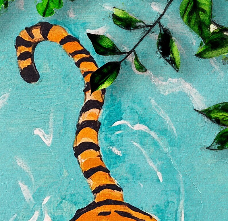 May include: A close-up of a tiger tail painted in orange and black stripes against a blue background with white accents. Green leaves are visible in the top right corner of the image.