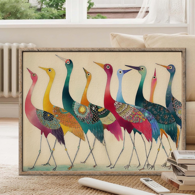 May include: A framed art print featuring a line of colorful birds with long necks and legs. The birds are depicted in shades of pink, yellow, teal, orange, red, and blue, with patterned details on their bodies. The artwork has a vintage aesthetic.