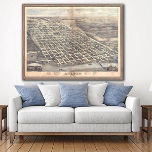 May include: A vintage map of Austin, Texas, printed in black and white with brown accents. The map shows the city's layout with streets and buildings. The title "Austin, Texas" is printed at the bottom of the map.