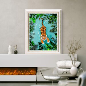 May include: A framed illustration of a tiger swimming in a turquoise blue pool of water surrounded by green foliage.