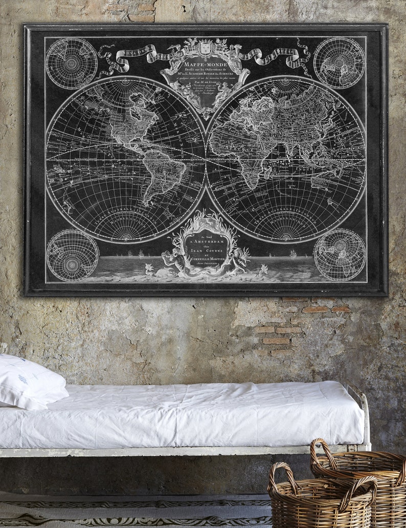 May include: A black and white vintage world map print with an ornate frame. The map is titled "Mappe-Monde" and features the text "Amsterdam chez Jean Covens."