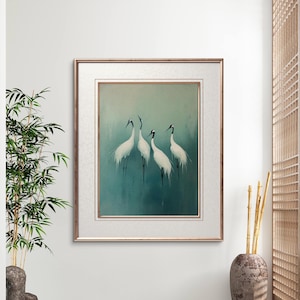 May include: Framed painting of four white cranes standing in a blue-green water setting. The cranes are facing different directions and have black legs and beaks.