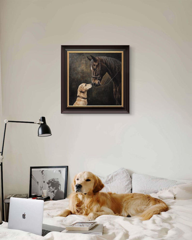May include: A framed painting of a brown horse and a golden retriever dog looking at each other. The horse is wearing a bridle and the dog is looking up at the horse. The painting is set against a dark background.