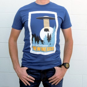 Now Leaving New Mexico – Cool Blue Unisex Tee