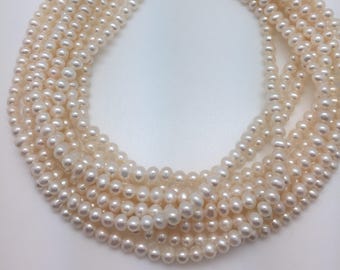 Lots of Luster! White Round 4 - 5mm Freshwater Pearls Strand