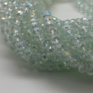 6x8mm Clear w/ Green Tint Faceted Rondelle Crystal Strand-17&quot;