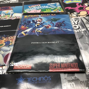 Replacement Original Super Nintendo Video Game Instruction Manuals, Super Mario World, MegaMan X, Yoshi, Baseball, Basketball, and More