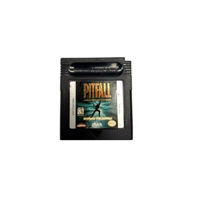 May include: A black Game Boy Color cartridge with a gold label that reads "Pitfall: Beyond the Jungle". The game is rated E for Everyone by the ESRB.