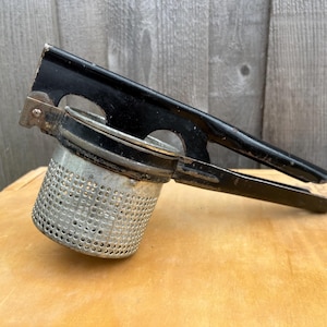 vintage potato ricer