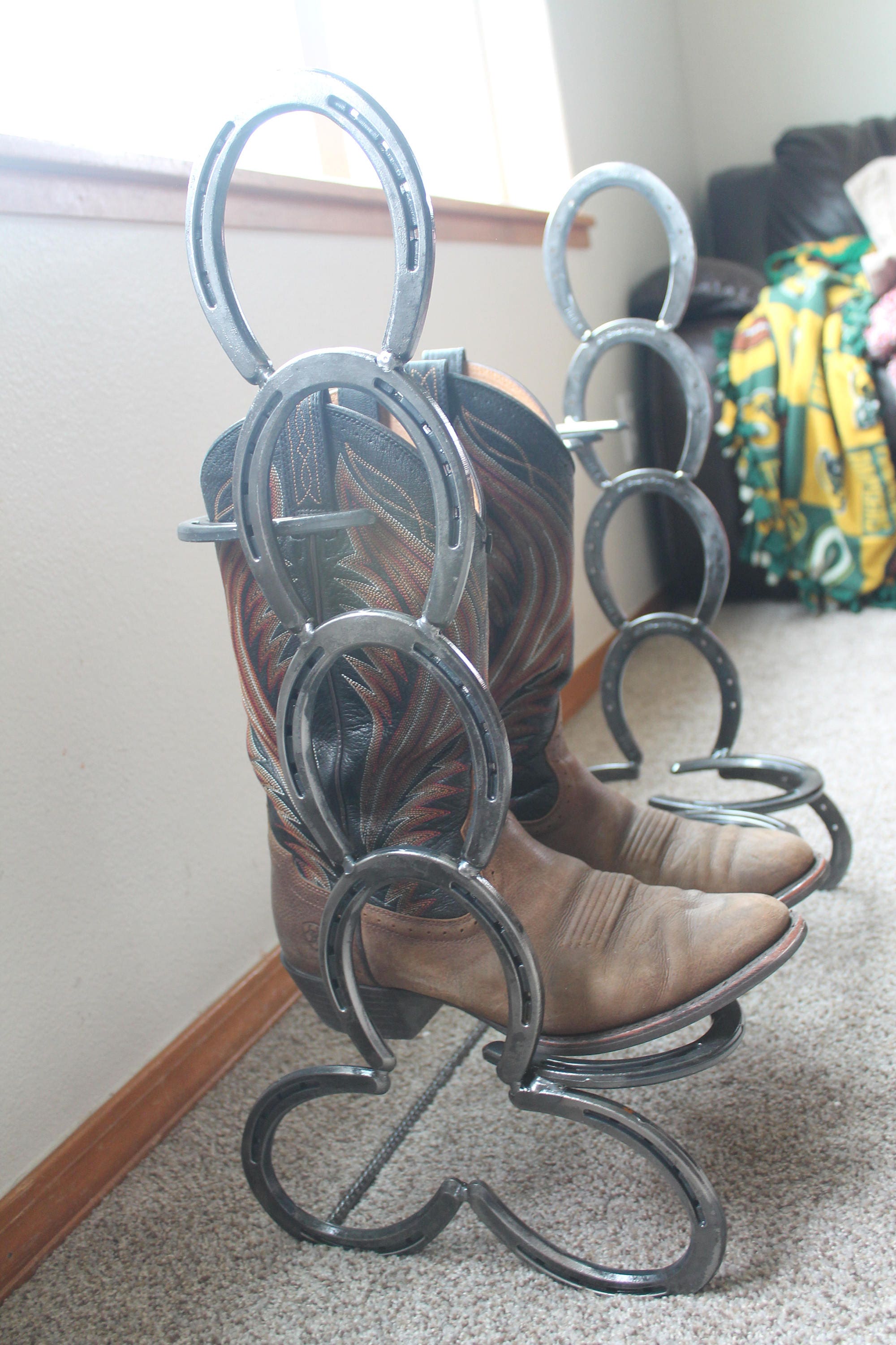 Horseshoe boot rack holds 2 pairs