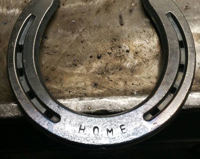 Horseshoe stamped with letters or numbers