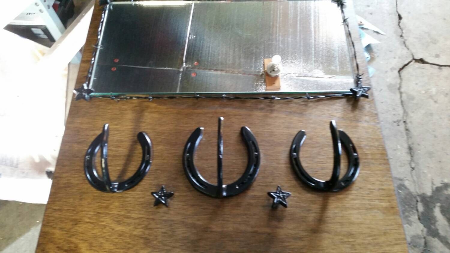 Horseshoe coat/hat rack with mirror