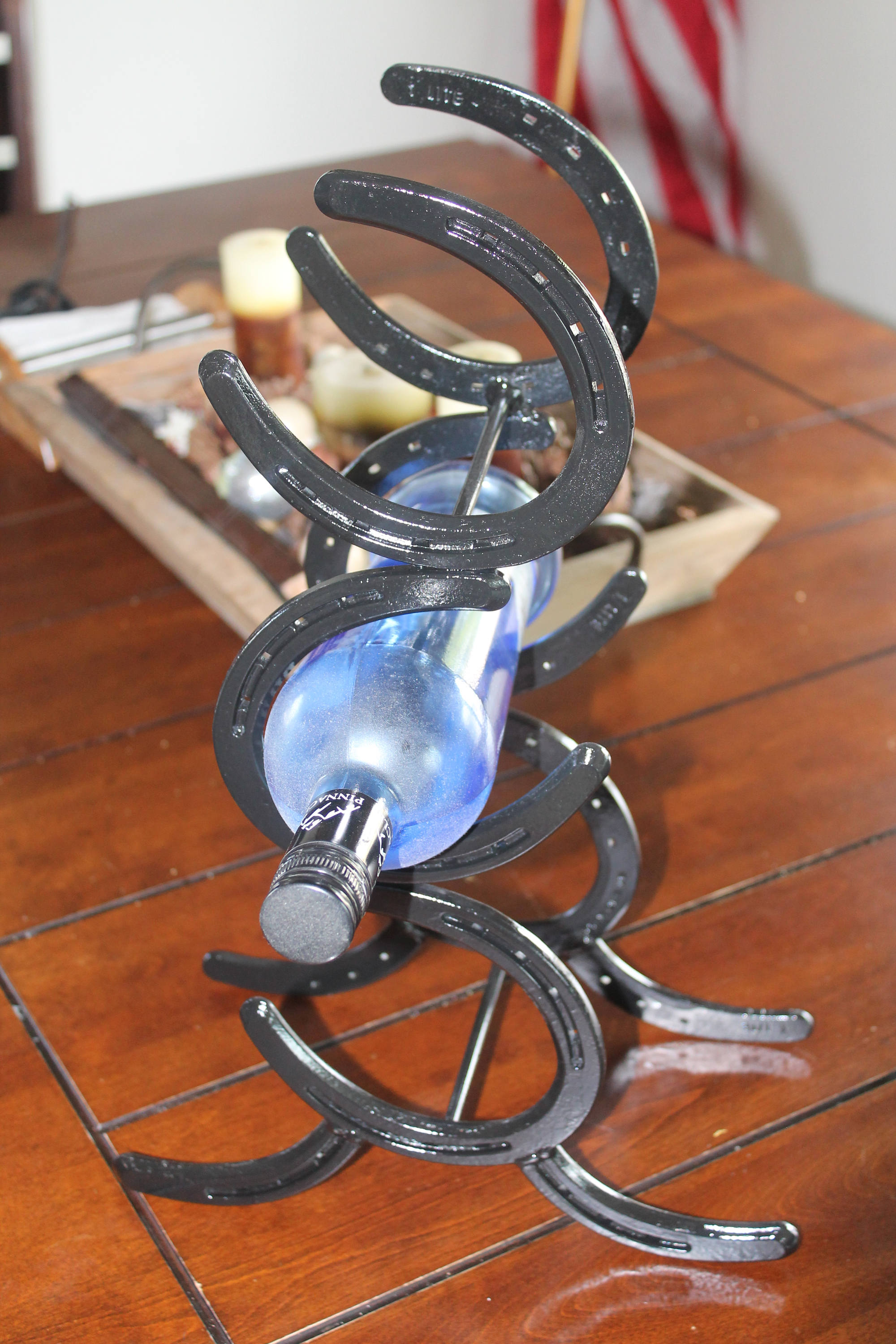 Horseshoe Wine Rack standing holds three bottles