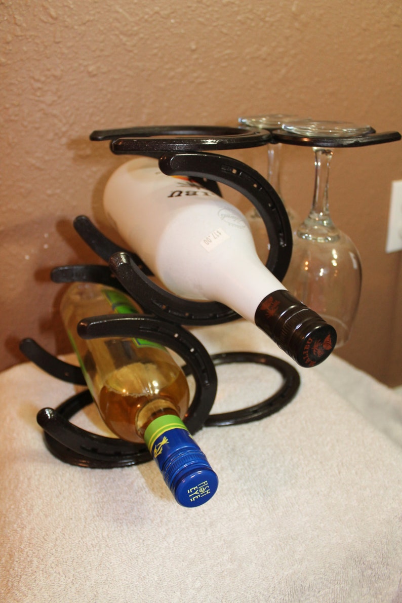 Horseshoe wine rack that holds two bottles and two glasses and Etsy