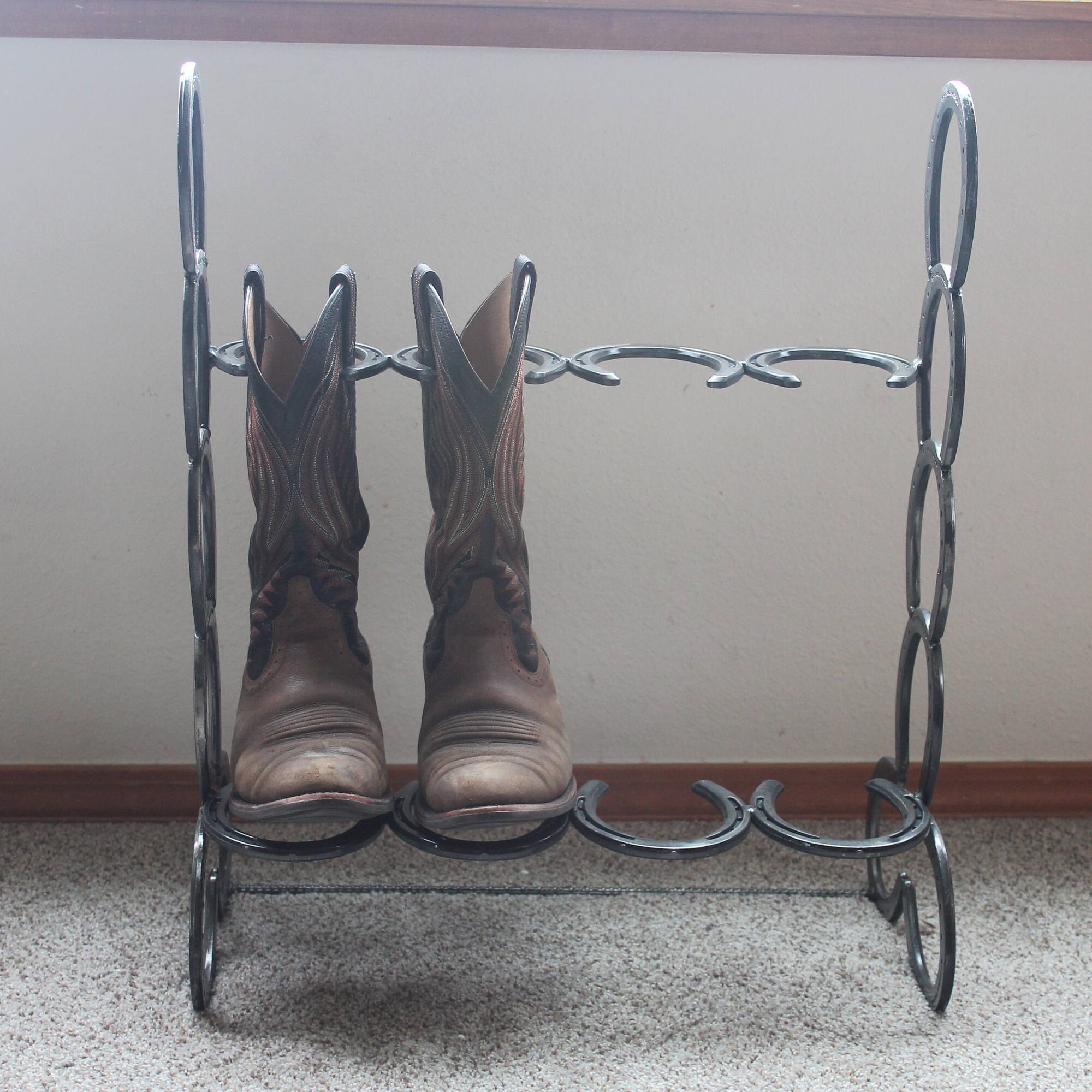 Horseshoe boot rack holds 2 pairs