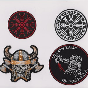 May include: Four embroidered patches with Viking themes. The first patch is a red and black compass with runes. The second patch is a black and white compass with runes. The third patch is a black skull with a horned helmet and crossed axes. The fourth patch is black with red and white accents and says "Till the Halls of Valhalla".