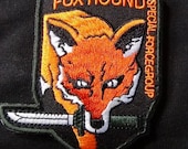 Engranaje De Metal Negro Sólido MGS FOX HOUND Grupo De Fuerza Especial