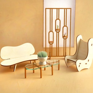 May include: A white, modern, curved sofa, a white chair with a curved back, a glass coffee table, and a wooden room divider with shelves holding small potted plants. The room divider is in the background, and the furniture is in the foreground.