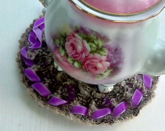 Sweet natural colored gray and purple wool Trivet, with. decoratively crocheted  handspun yarn, purple velvet ribbon, hand made, available