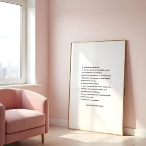 Puede incluir: Una impresi&oacute;n enmarcada con fondo blanco y texto negro. El texto es una cita de Ralph Waldo Emerson sobre el &eacute;xito, la risa y el respeto. El marco es dorado y la impresi&oacute;n est&aacute; colgada en una pared rosa.