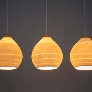 Modern Pendant Lighting.  Dining room Lights. Modern Lamps. Lamp Shades. Kitchen Island Lights.