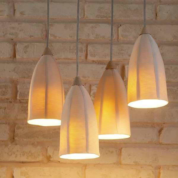 A Cluster of 4 unique Porcelain Pendant Lights. Contemporary lighting. White Hanging Shades for the Dining room.