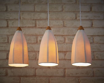 3 Pendant lights. Modern Chandelier. Hanging Pendants. Bar lights. Porcelain Pendants Lighting. White tall shades.