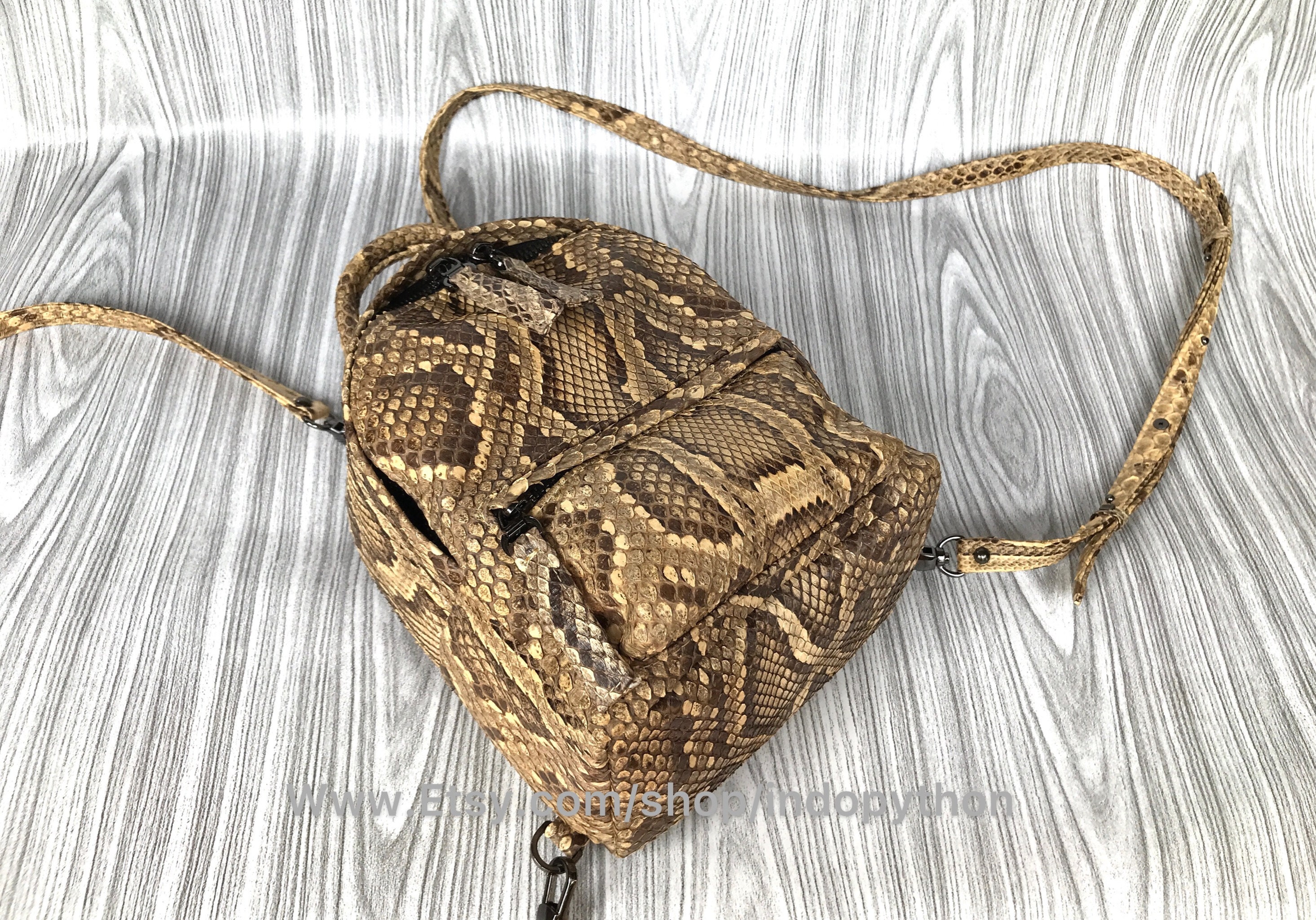 Cream Backpack with Snake-Print Base and Gold Hardware image_ee0a1033-a1fe-493a-bd56-  main image 4