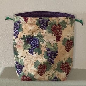 Knitting or crocheting on the go bag will hold up to 3 cakes of yarn