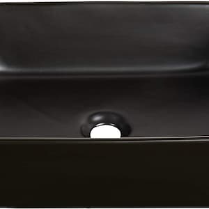 May include: A black ceramic vessel sink with a square shape and a single drain hole in the center.